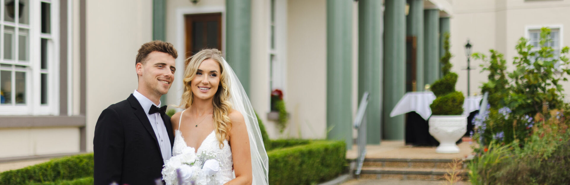 Bride and Groom overlooking the sea The Grand Hotel in Malahide