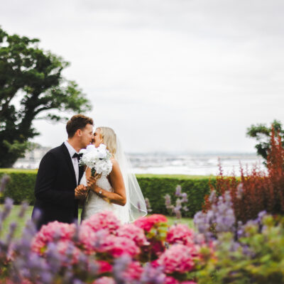 Wedding Couple with a coastal background The Grand Hotel in Malahide